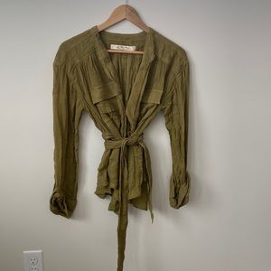 Like new- Free people shirt worn one time.